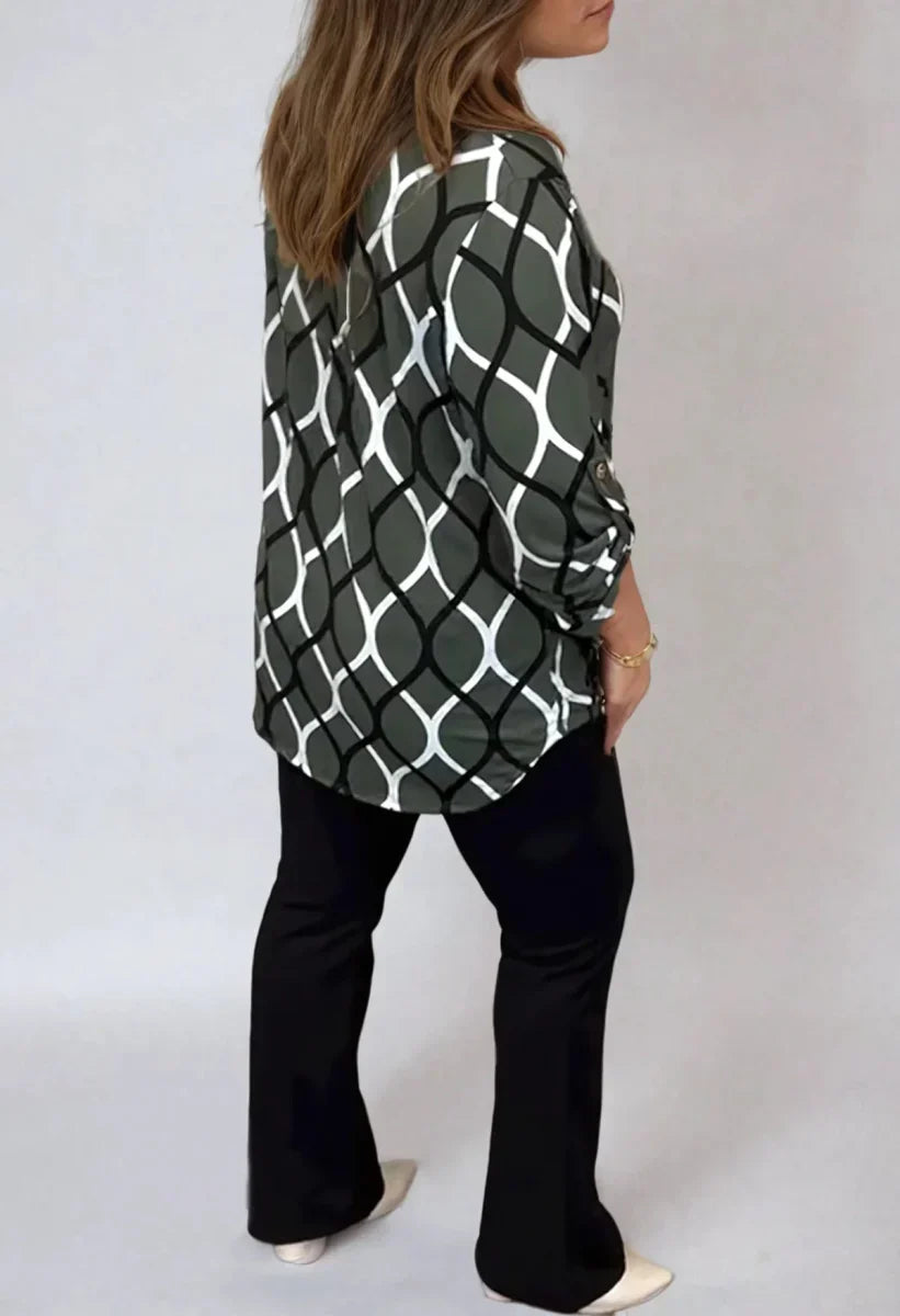 SAVANNAH – ELEGANTE BLOUSE MET GOLVENPRINT