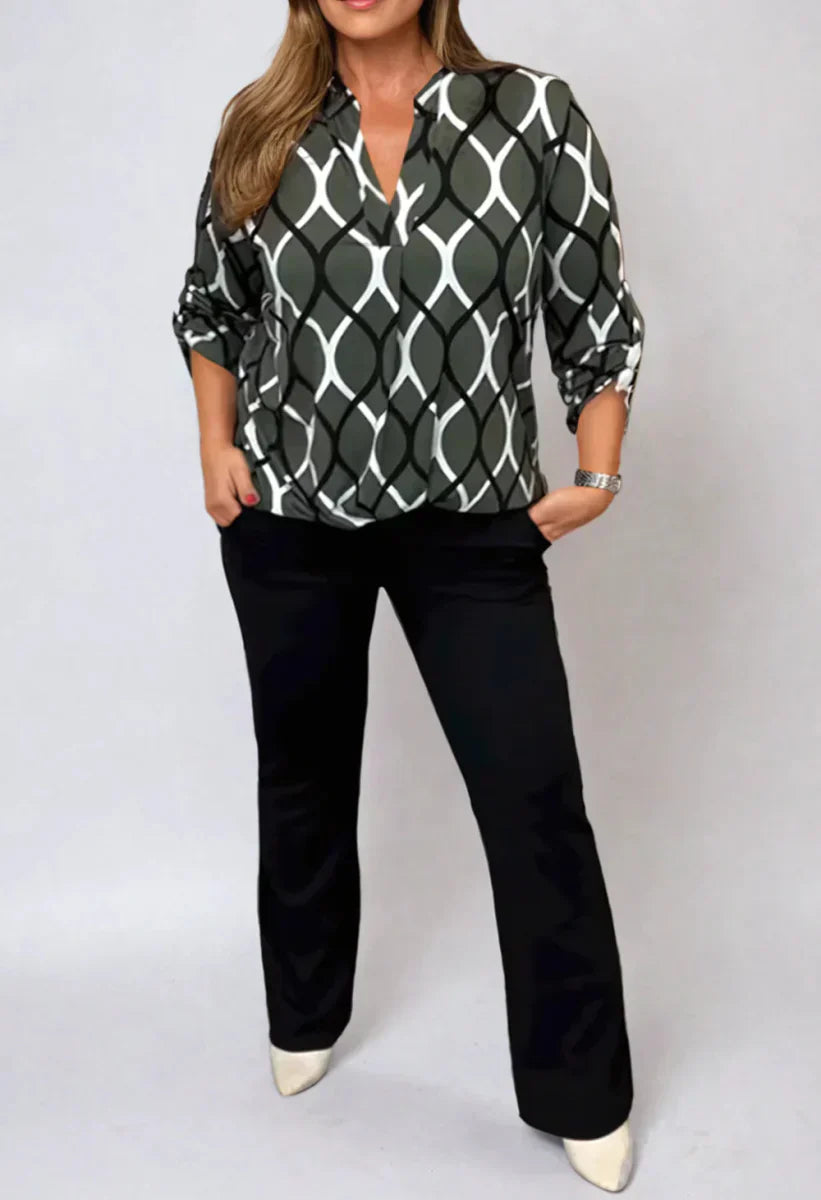 SAVANNAH – ELEGANTE BLOUSE MET GOLVENPRINT